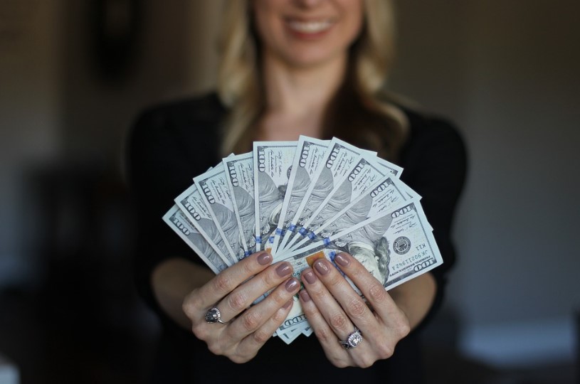 Employee holding cash
